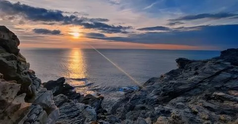 Sunset on the sea Stock Photos