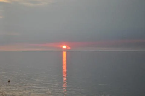 Sunset by the sea Stock Photos
