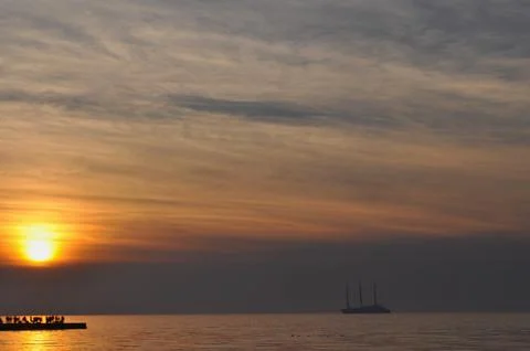 Sunset by the sea Stock Photos