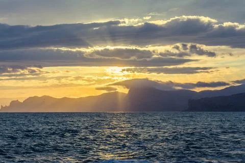 Sunset by the sea Stock Photos