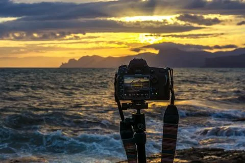 Sunset by the sea Stock Photos