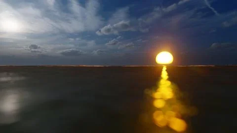 The sunset on the sea, the play of sun rays on the waves, the blue sky with.. Stock Illustration