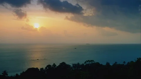 Sunset on the sea in the rainforest from a height Video stock 92226646