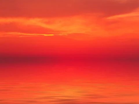 Sunset sea red background Stock Photos