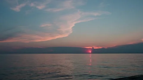 Sunset by the sea with ripple waves. Stock Footage 306030651