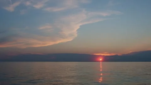 Sunset by the sea with ripple waves. Stock Footage 311528467