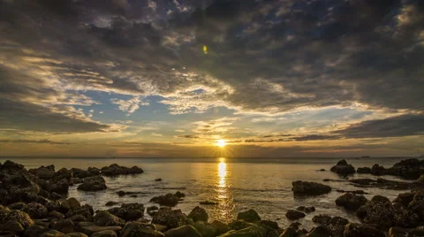 Sunset on sea in rocks bay time lapse Video stock 59667618