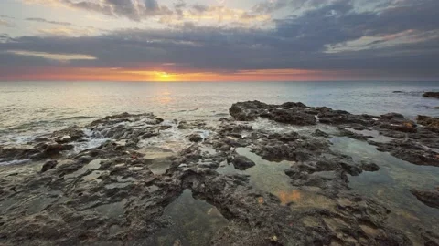 Sunset on the sea shore. Video stock 185413737
