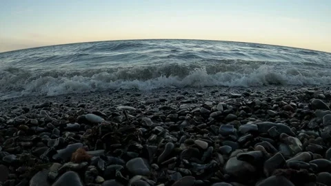 Sunset by the sea - shot from ground level Stock Footage 155034519