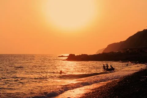 Sunset on a sea side Stock Photos