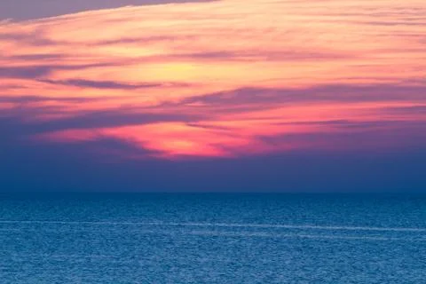 Sunset sea sky Stock Photos