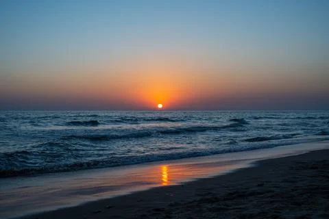 Sunset at sea in Spain Stock Photos