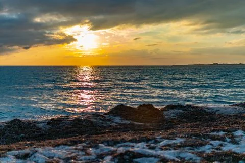 Sunset on the sea in summer Stock Photos