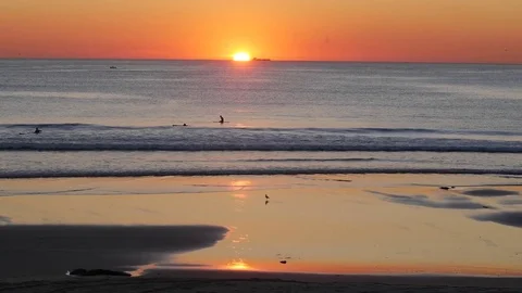 Sunset sea surf beach reflection Stock Footage 79997145