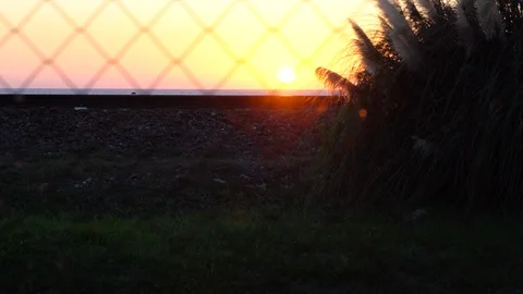 Sunset on the sea train rides. Stock Footage 101395509