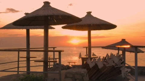 Sunset on the sea under the parasol, Time Lapse Stock Footage 88565333