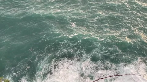 Sunset sea wave hitting on the cliff, Cinque Terre, Italy, top-down view 動画素材 263258867