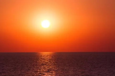 Sunset sea waves Stock Photos