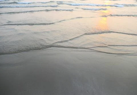 Sunset sea waves Stock Photos