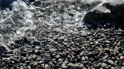 Sunset sea waves storm stone wild beach Stock Footage 99190615