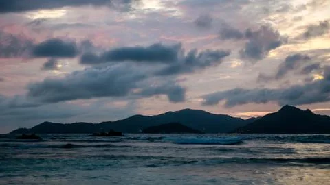 Sunset seascape with dramatic sky and stormy clouds Stock Photos