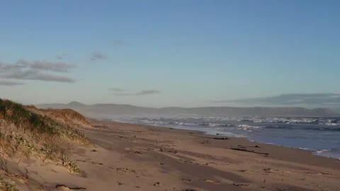Sunset Seascape on an Empty Beach Stock Footage 310950666