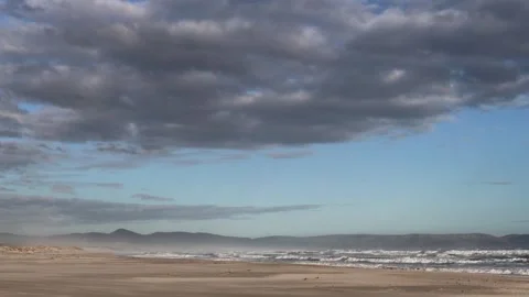 Sunset Seascape on an Empty Beach Stock Footage 310950670