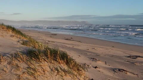 Sunset Seascape on an Empty Beach Stock Footage 310950763