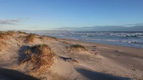 Sunset Seascape on an Empty Beach Stock Footage 310951036