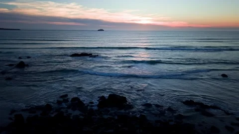Sunset seascape with rocks and ocean waves aerial footage Stock Footage 331194354