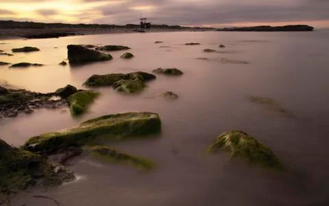 Sunset seascapes with rocks Foto stock