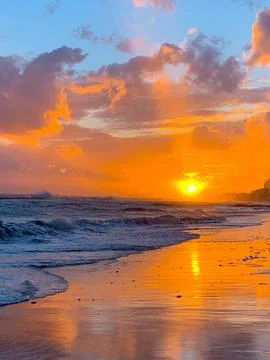 Sunset at the seashore Stock Photos