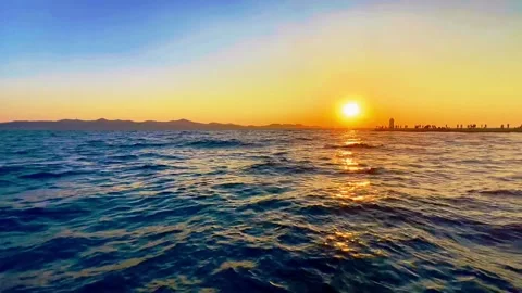 Sunset on the seashore at the pier Stock Footage 259435775