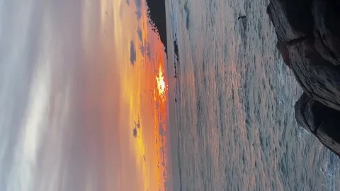 Sunset on the seashore. a scarlet sunset. The ocean at sunset Stock Footage 274658659