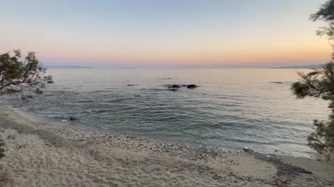 Sunset at Seaside Beach with Trees in Summer, Agokiri, Naxos, Greece Stock Footage 339685384