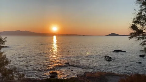 Sunset at Seaside Beach with Trees in Summer, Agokiri, Naxos, Greece Stock Footage 339687599