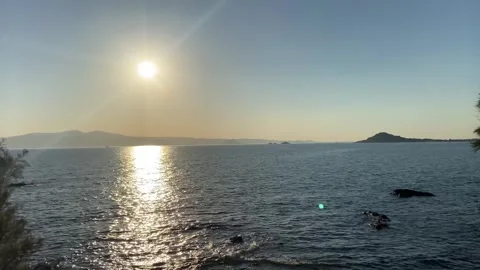 Sunset at Seaside Beach with Trees in Summer, Agokiri, Naxos, Greece Stock Footage 339688095
