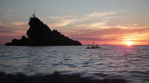 Sunset at the seaside with island Stock Footage 169369733