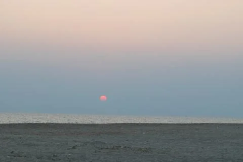 Sunset at the seaside Stock Photos