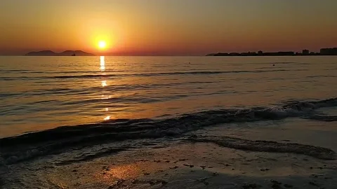 Sunset at the seaside. Sunny summer evening in Vlora, Albania. Sazan Island. Stock Footage 155443418