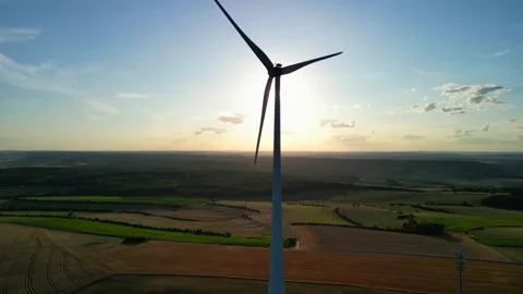 Sunset seen through wind turbine blades Stock Footage 246368451