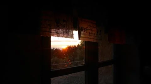 Sunset seen through the window Stock Photos