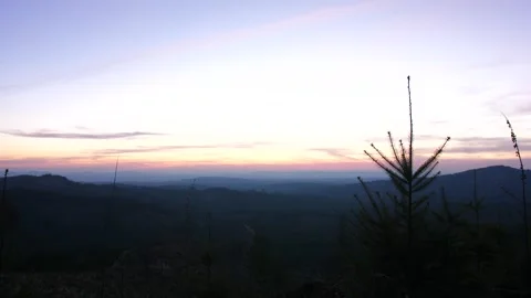 Sunset seen from top of a mountain range. Stock Footage 241880360