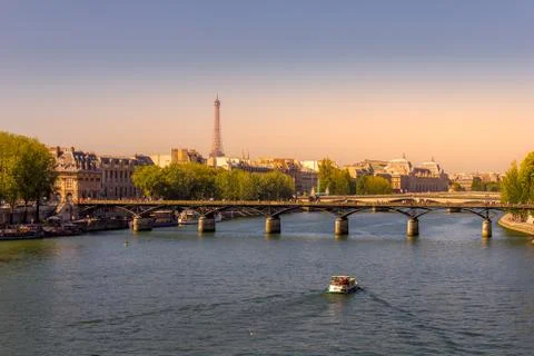 Sunset in the Seine river with the Eiffel Tower in the background Stock Photos