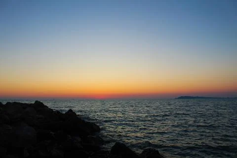 "Sunset Serenade: Capturing Golem Beach and the Adriatic Sea in Durres, Albania Stock Photos