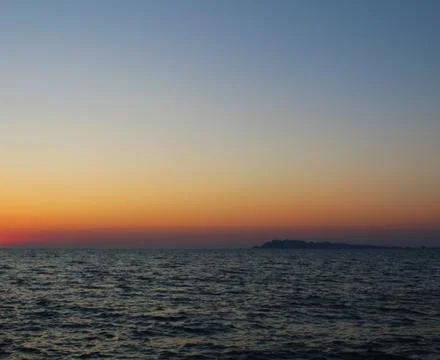 "Sunset Serenade: Capturing Golem Beach and the Adriatic Sea in Durres, Albania Stock Photos
