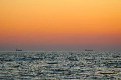 "Sunset Serenade: Capturing Golem Beach and the Adriatic Sea in Durres, Albania Stock Photos