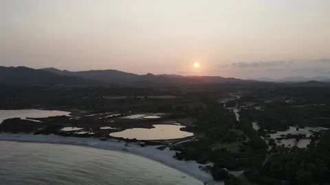 Sunset Serenity: Aerial View of Lu Impostu Beach Stock Footage 245167295