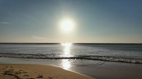 Sunset Serenity, Ocean Reflections at Dusk Stock Footage 259689061