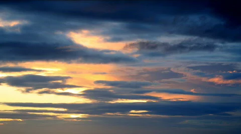 Sunset sets displaying a unique cloud and tonal combination. Video stock 375849